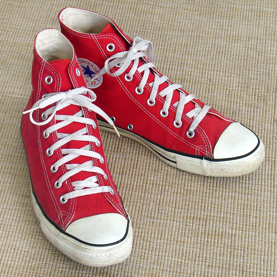 Vintage red hi-top American-made Converse All Star Chuck Taylor shoes for sale at http://www.collectornet.net/shoes
