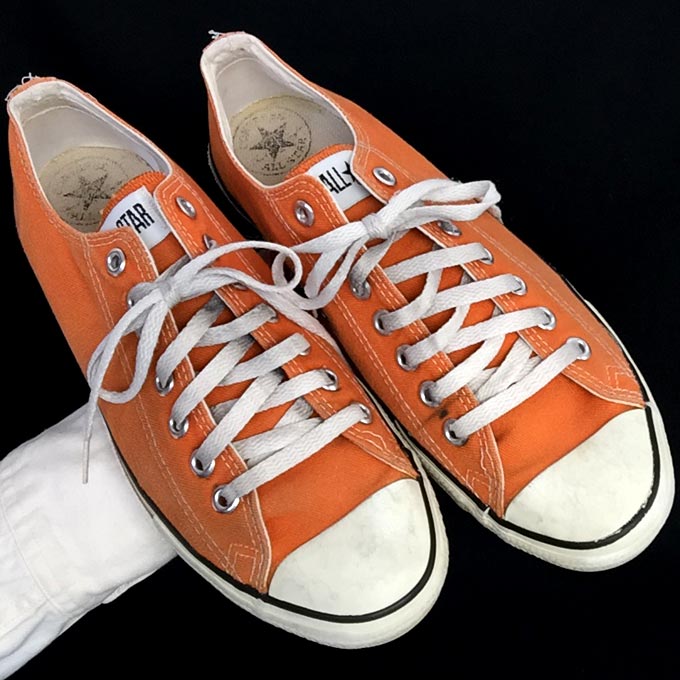 Vintage orange American-made Converse All Star Chuck Taylor shoes for sale at http://www.collectornet.net/shoes
